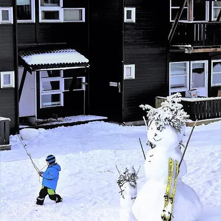 Alpinlandsby Pluss Lägenhet