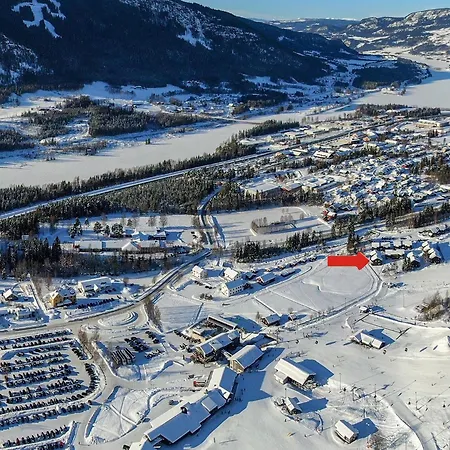 Alpinlandsby Pluss Lägenhet