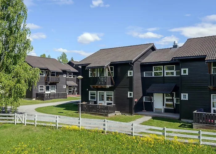 Alpinlandsby Pluss Lägenhet